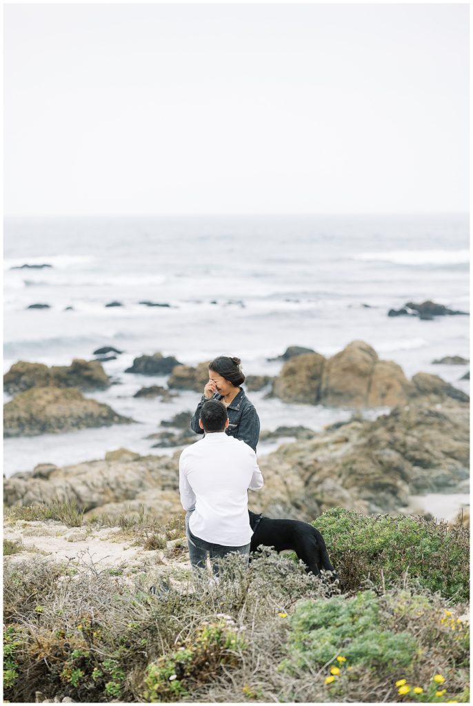 down on one knee at Spanish Bay