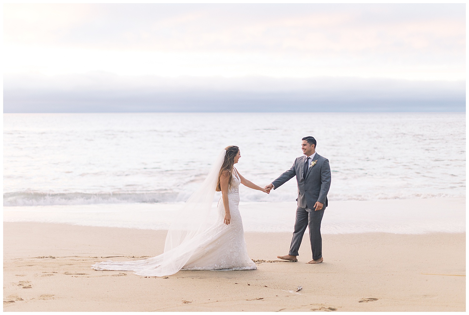 landscape shot of the bride and groom enjoying their Big Sur adventure elopement on the beach by film photographer AGS Photo Art