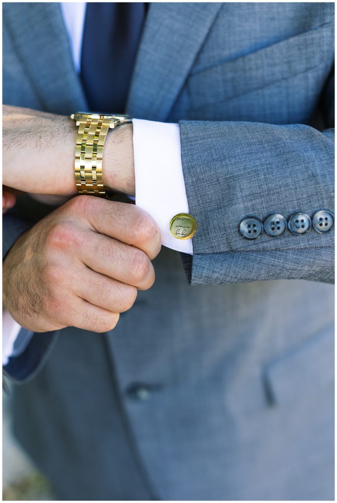 groom's button cuffs on his tux for his Big Sur elopement wedding