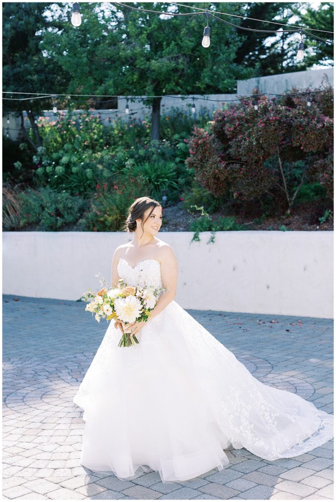 outdoor film bridal portrait in the courtyard