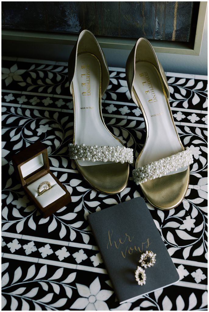 bride's details: pearl heels by Something BLEU, her ring box, and her vows