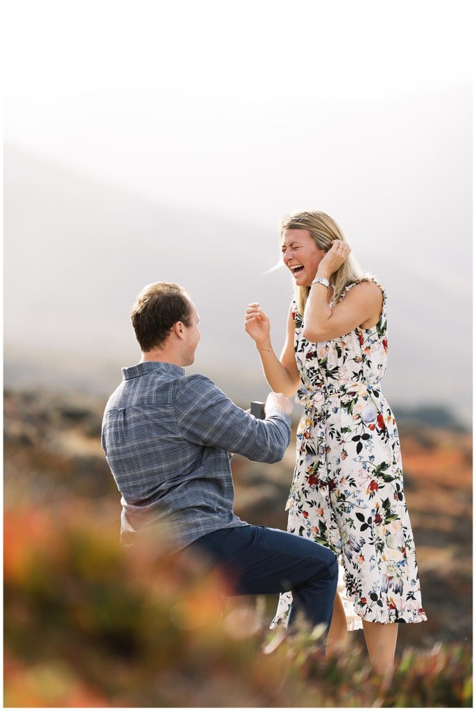 man down on one knee popping the question to his now fiancée by film photographer AGS Photo Art