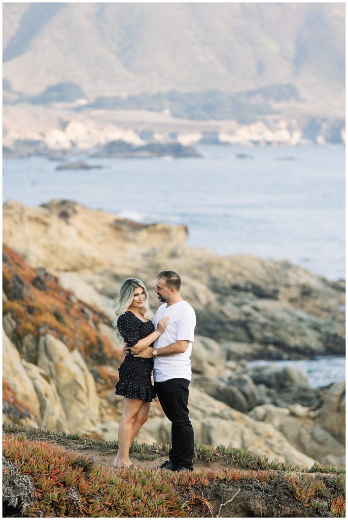 Big Sur Anniversary Session portrait of couple with cliffs and waves
