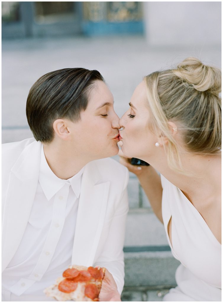 two brides sharing a kiss on their elopement wedding day by film photographer AGS Photo Art