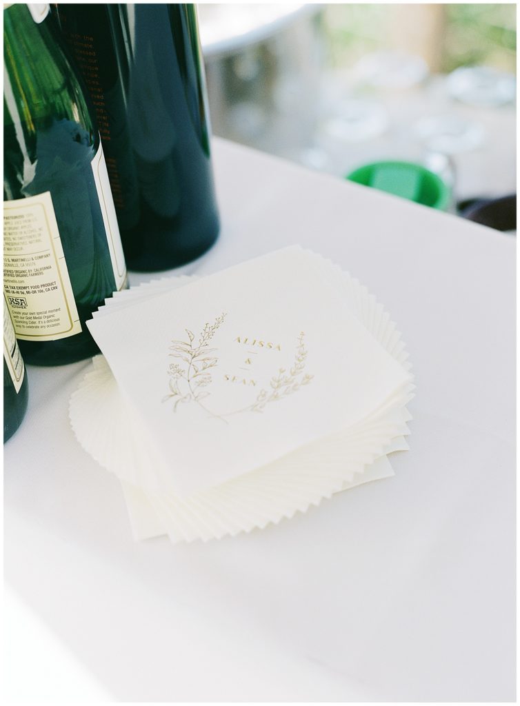 Wind & Sea Estate Big Sur wedding table napkins with "Alissa & Sean" written on them