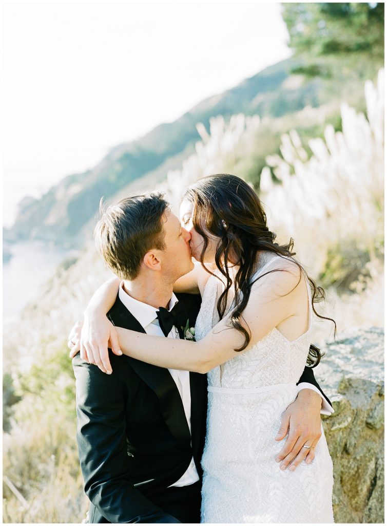 portrait of the bride and groom sharing a kiss by film photographer AGS Photo Art