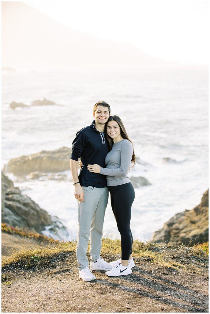 Big Sur surprise proposal portrait with the waves behind the couple