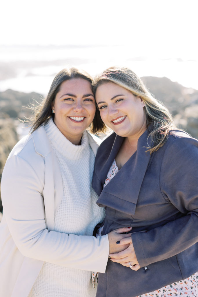 portrait of two smiling women during their surprise proposal in Carmel