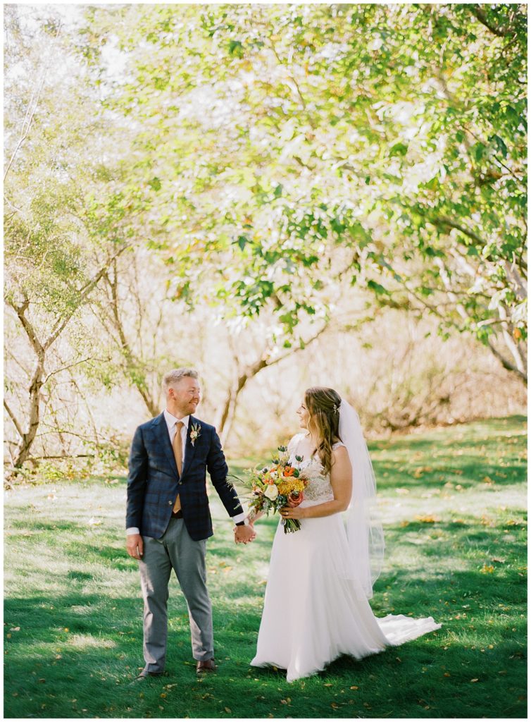 Gardener Ranch wedding photography of the bride and groom under the trees