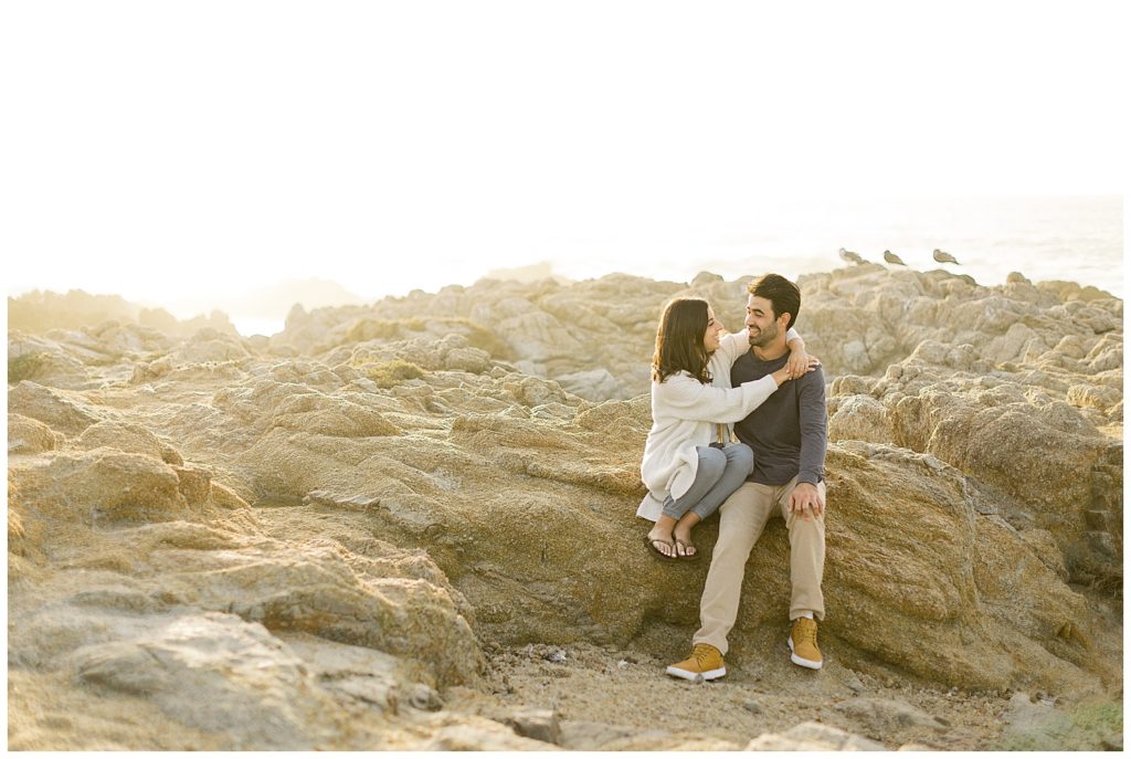 engagement session cuddles in Pebble Beach