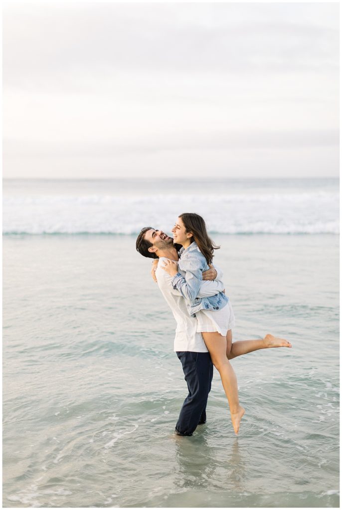 engagement session in the water at Pebble Beach