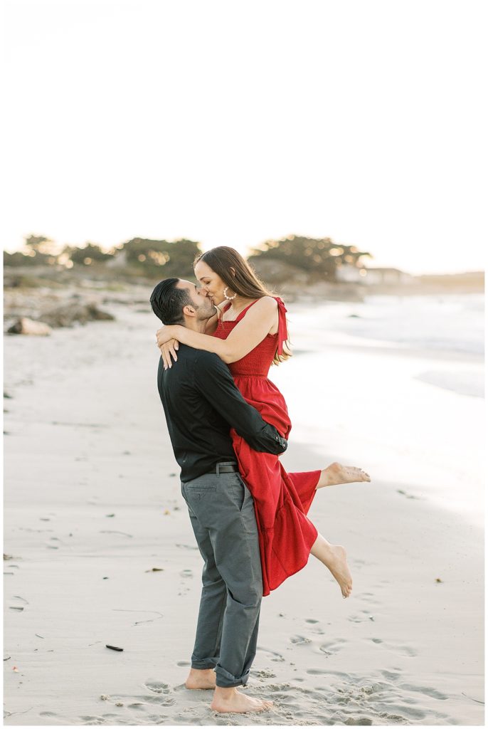 spinning and kissing portrait on the beach