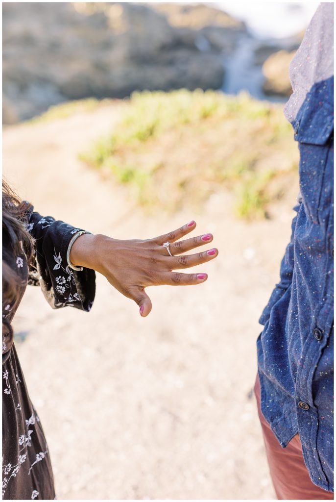 portrait of a woman admiring her new engagement ring after Big Sur Surprise Proposal