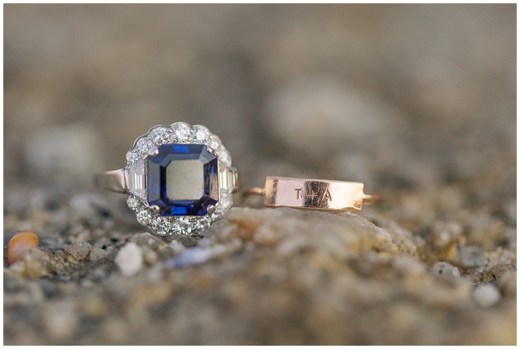 image of an engagement ring and gold band ring