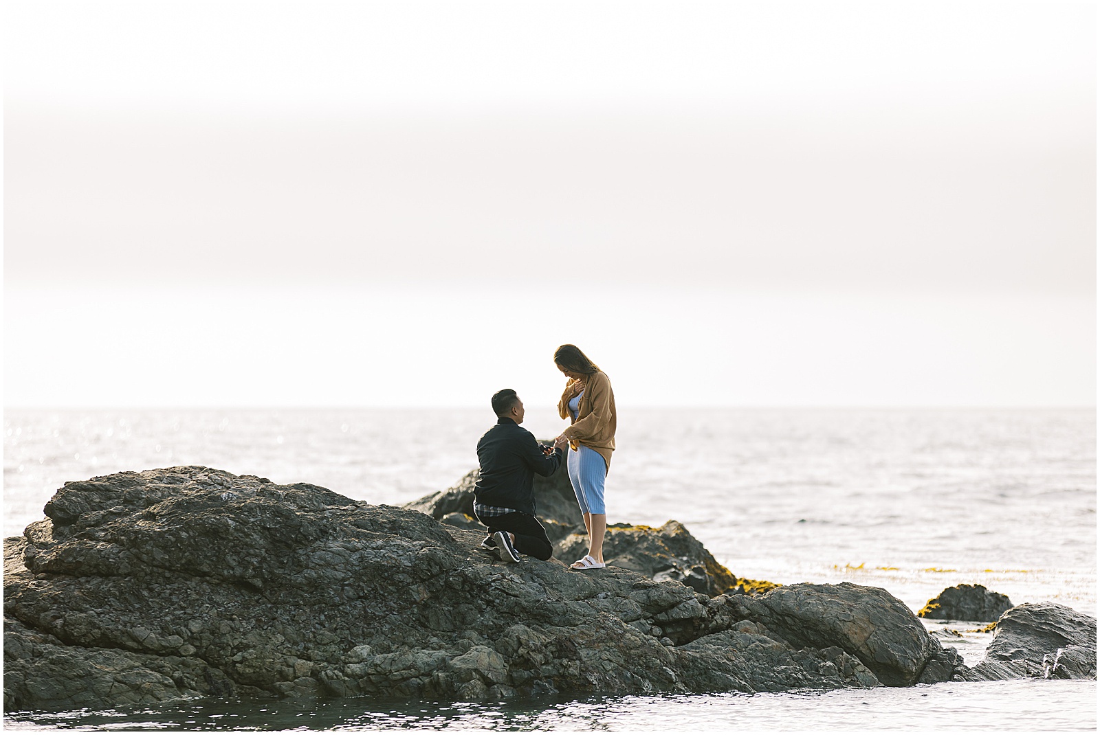 Man proposing to woman on the beach by film photographer AGS Photo Art