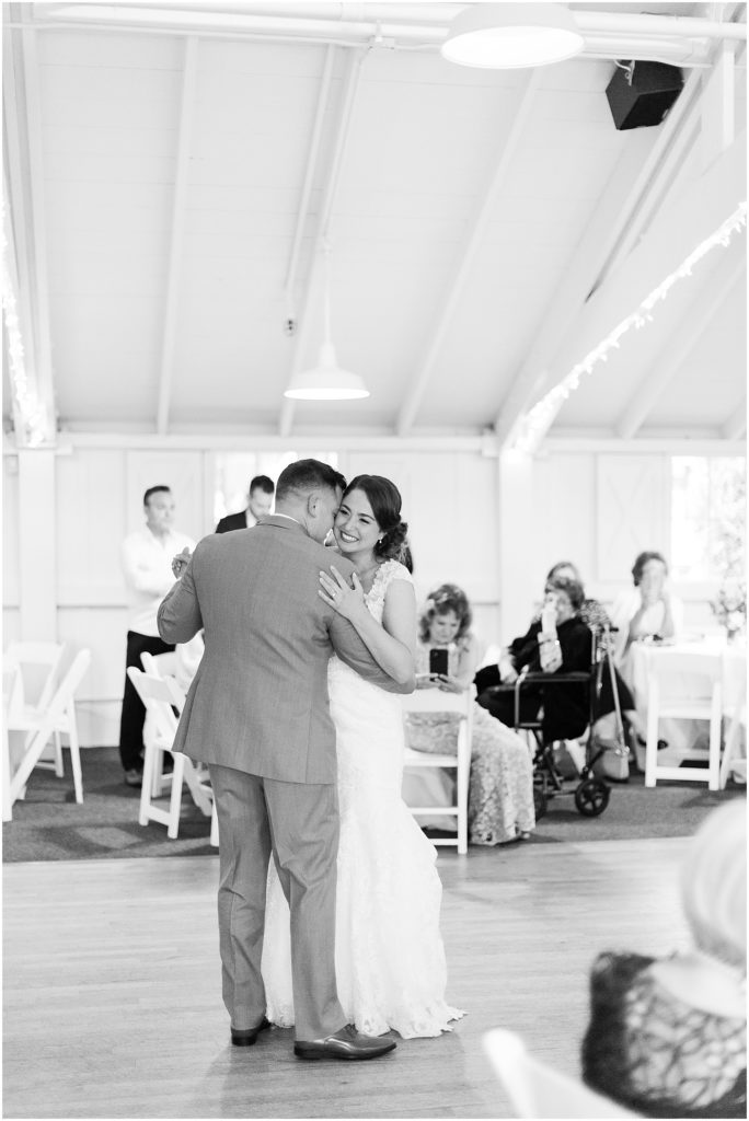 portrait of couple sharing first dance on dance floor by film photographer AGS Photo Art 