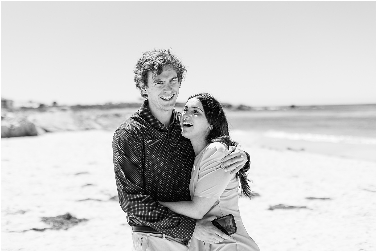 portrait of couple smiling by the ocean by film photographer AGS Photo Art