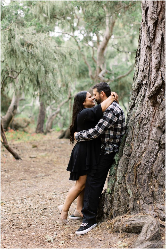 portrait of couple standing by tree by film photographer AGS Photo Art