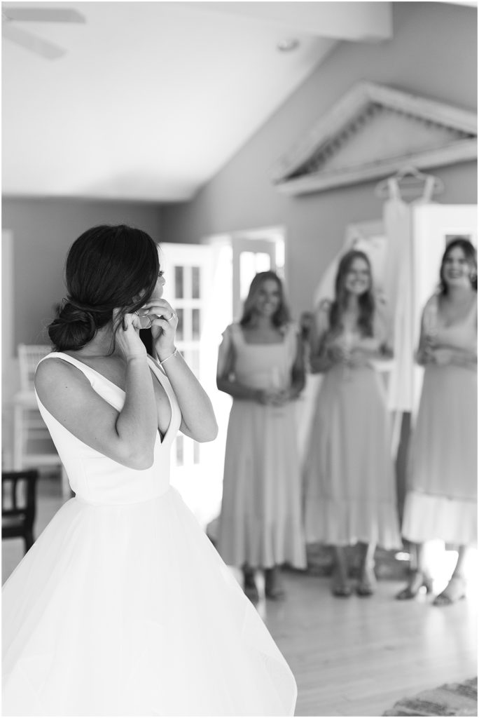 portrait of bridesmaids watching bride get ready  by film photographer AGS Photo Art 