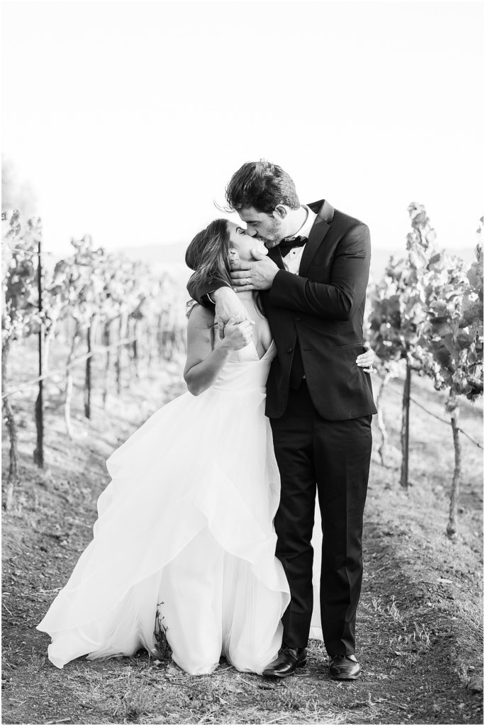 portrait of bride and groom walking in vineyard by film photographer AGS Photo Art