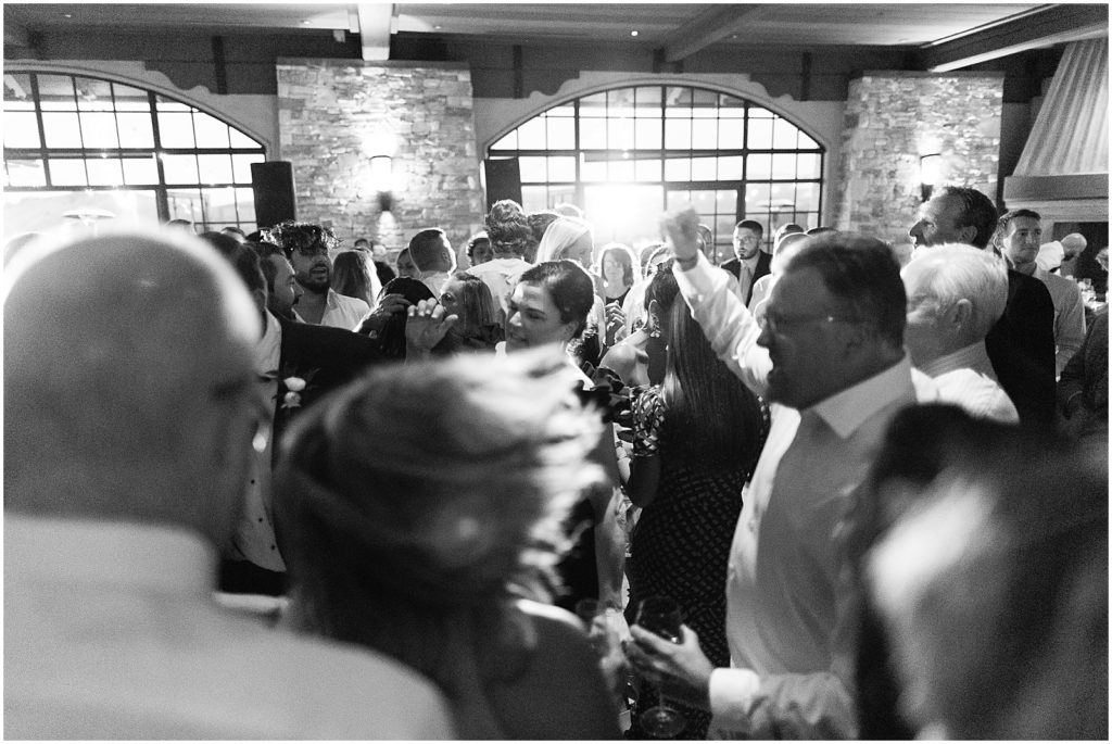portrait of wedding guests dancing on dance floor by film photographer AGS Photo Art 