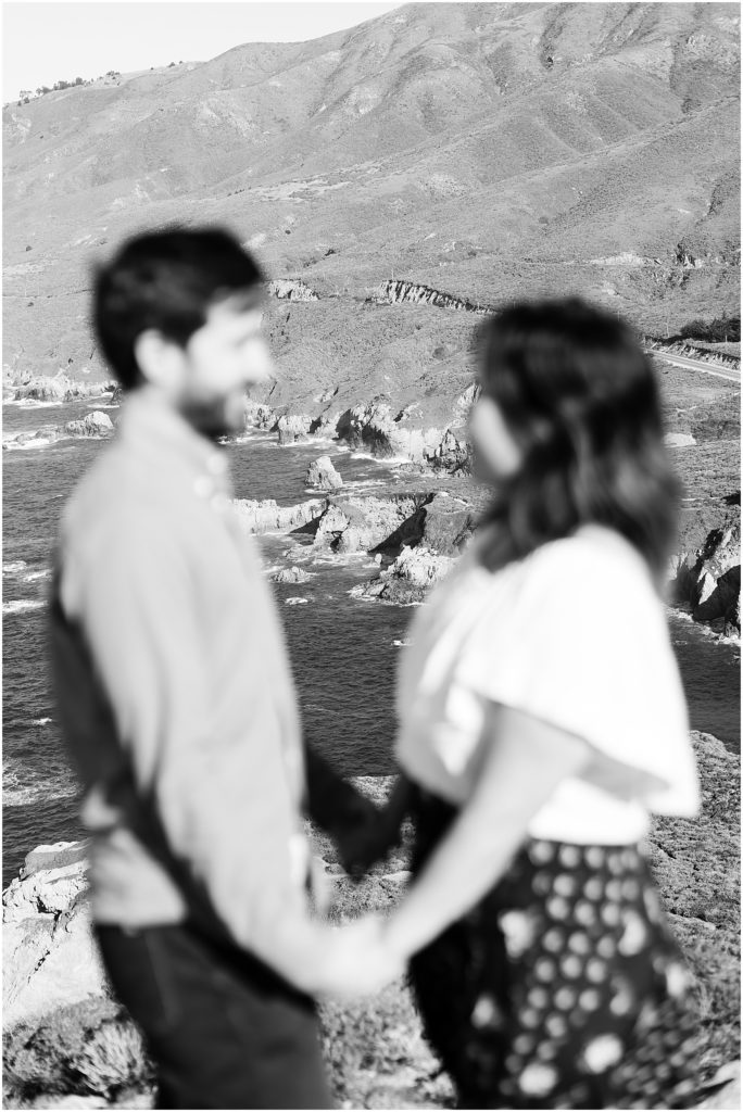 portrait of couple looking at each other in front of coastline by film photographer AGS Photo Art