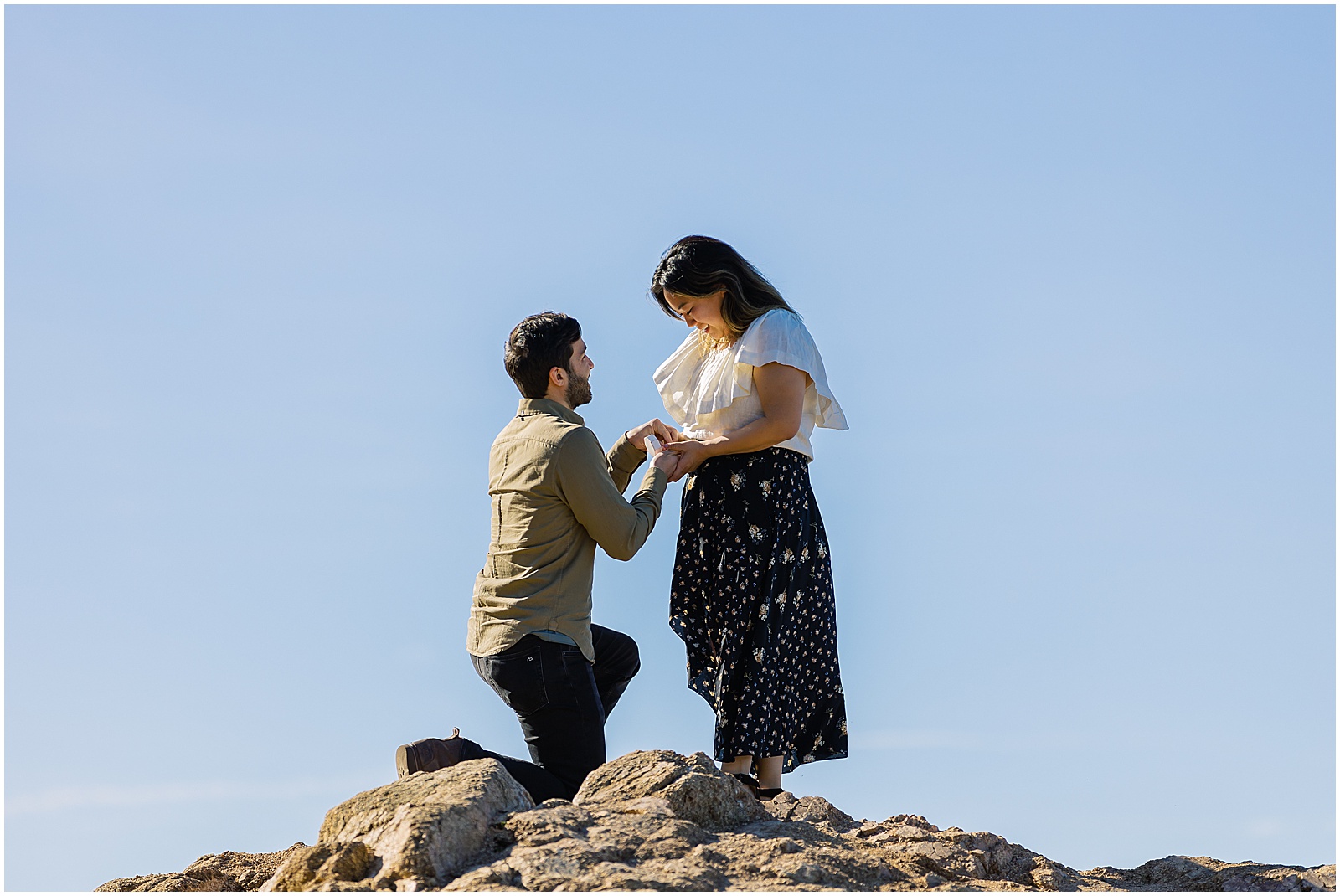 portrait of couple proposal with coastline of beach by film photographer AGS Photo Art