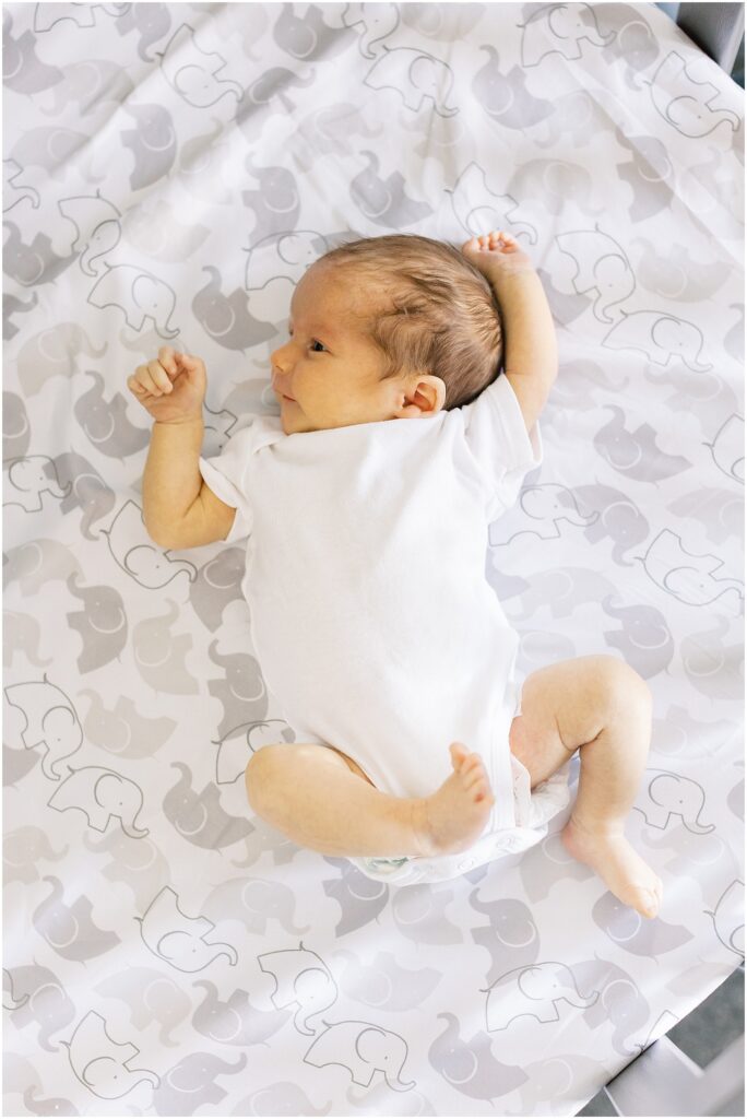 portrait of baby boy laying on blanket by film photographer AGS Photo Art