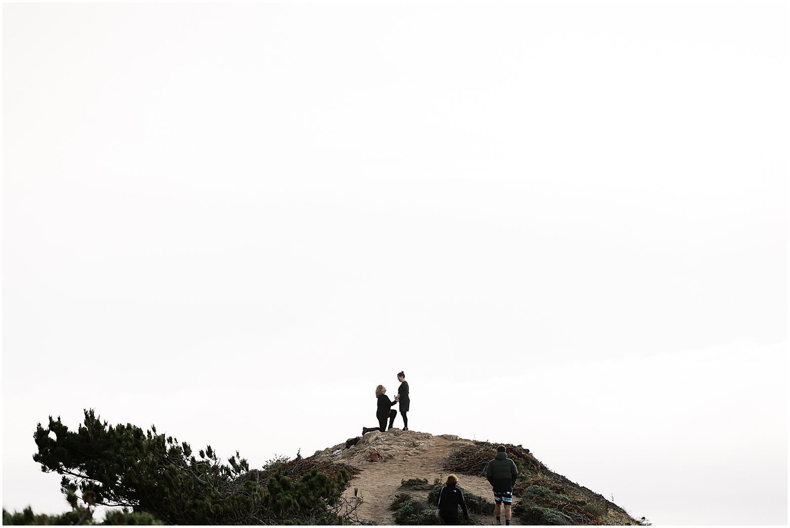 portrait of couple proposal on mountain peak by film photographer AGS Photo Art
