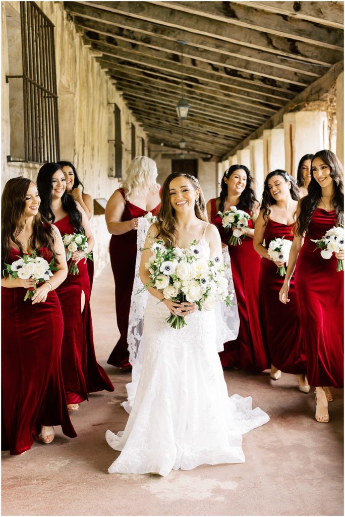 portrait of bride standing with bridesmaids by film photographer AGS Photo Art