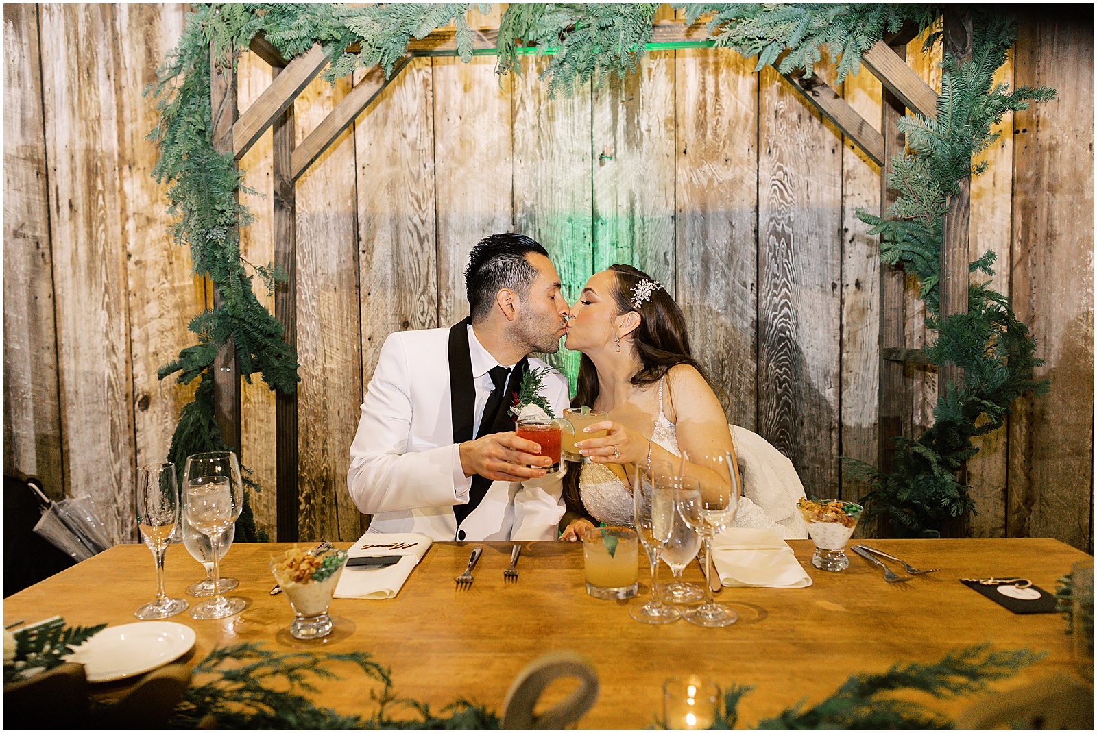portrait of bride and groom making a toast during reception by film photographer AGS Photo Art