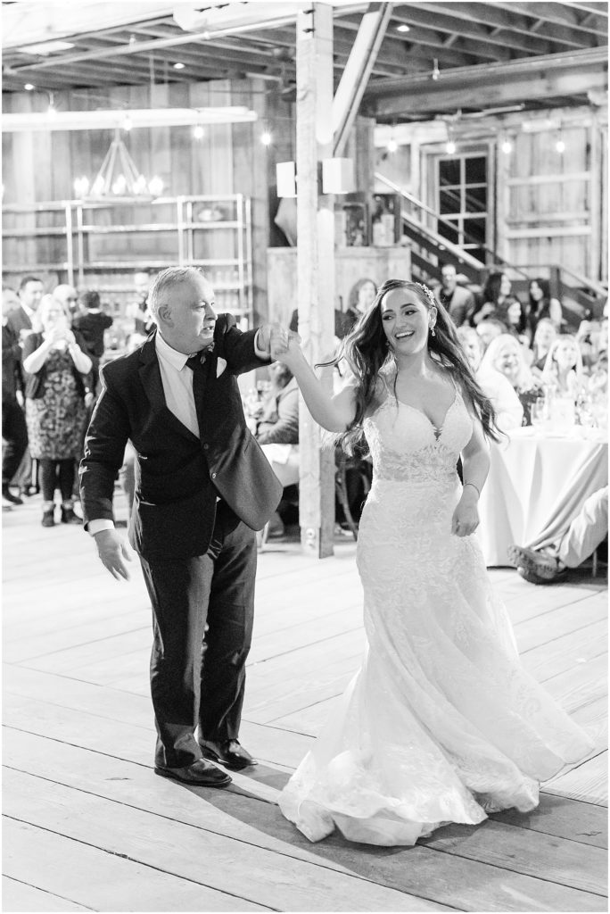 portrait of bride sharing dance with father on dance floor by film photographer AGS Photo Art