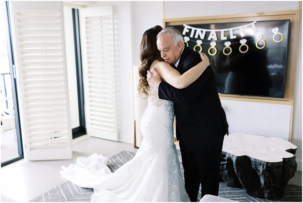 portrait of father hugging bride during first look by film photographer AGS Photo Art