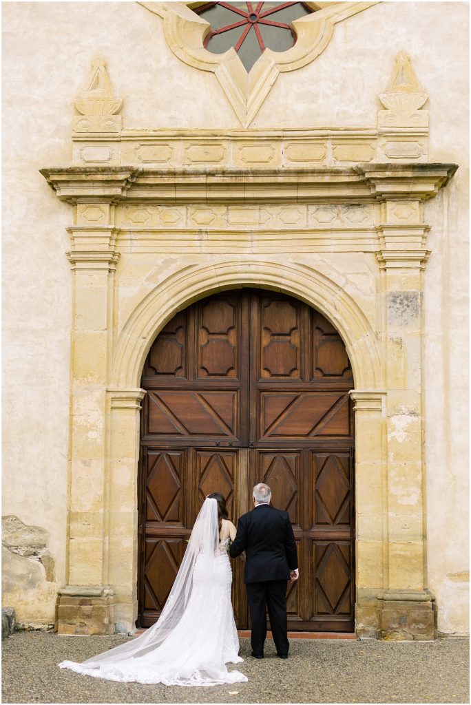 portrait of bride with father standing outside of cathedral by film photographer AGS Photo Art