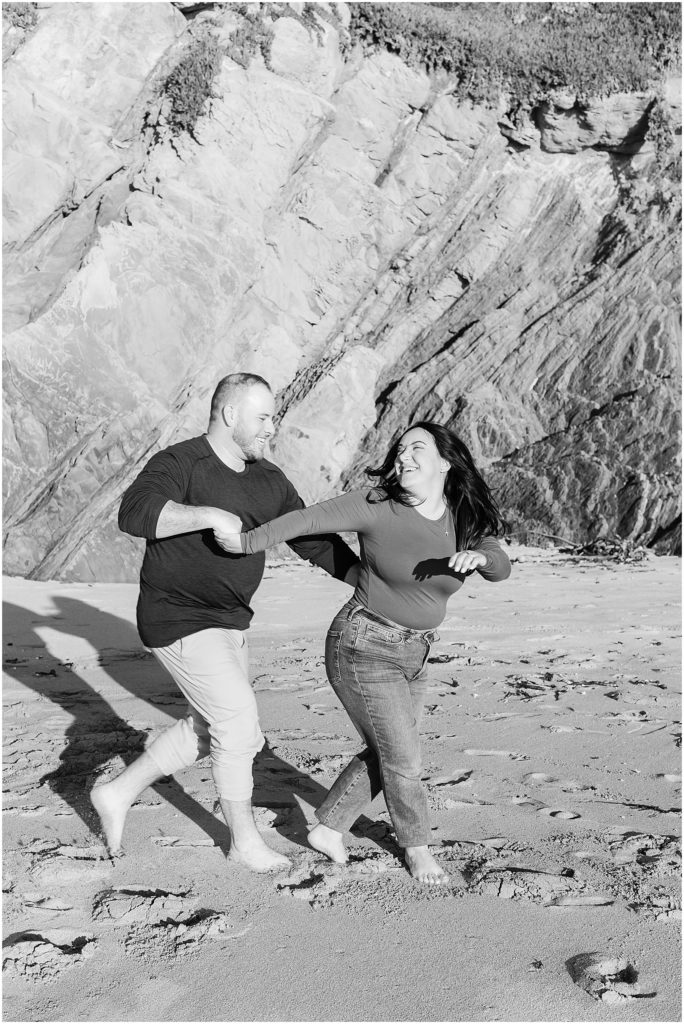 portrait of couple running on beach by film photographer AGS Photo Art