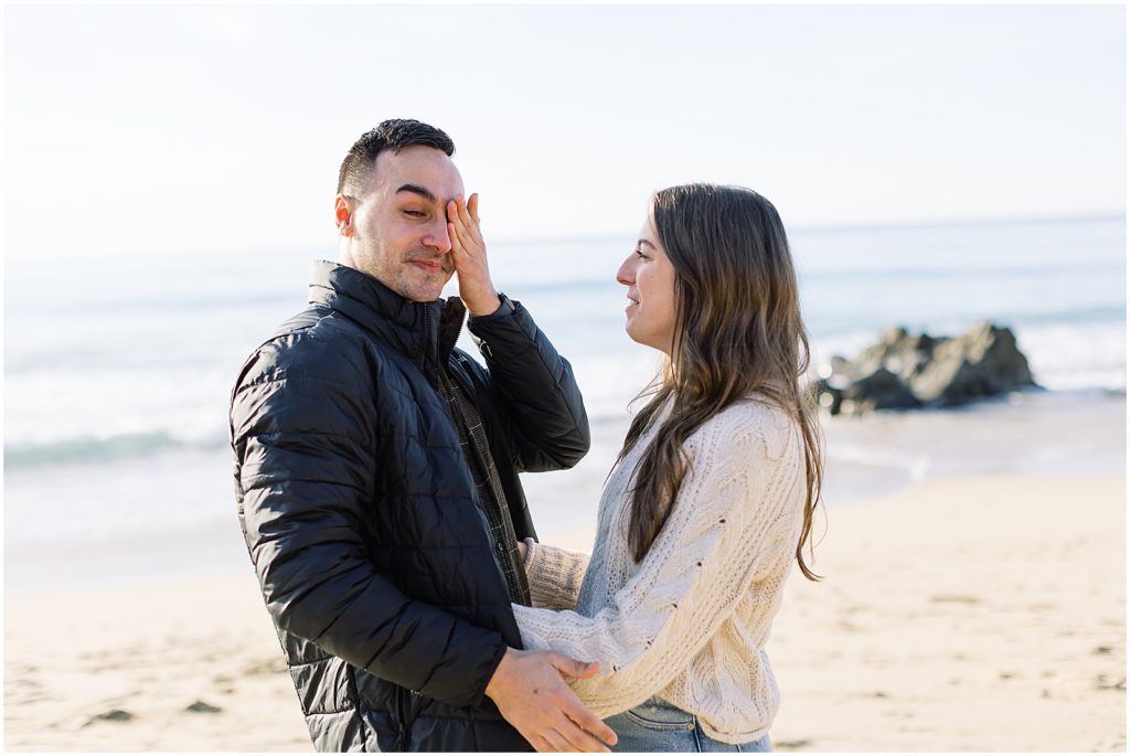 portrait of couple standing by ocean during surprise proposal by film photographer AGS Photo Art