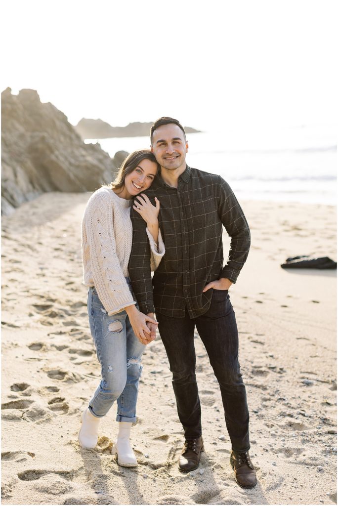 portrait of couple standing on sand at the beach during surprise proposal by film photographer AGS Photo Art
