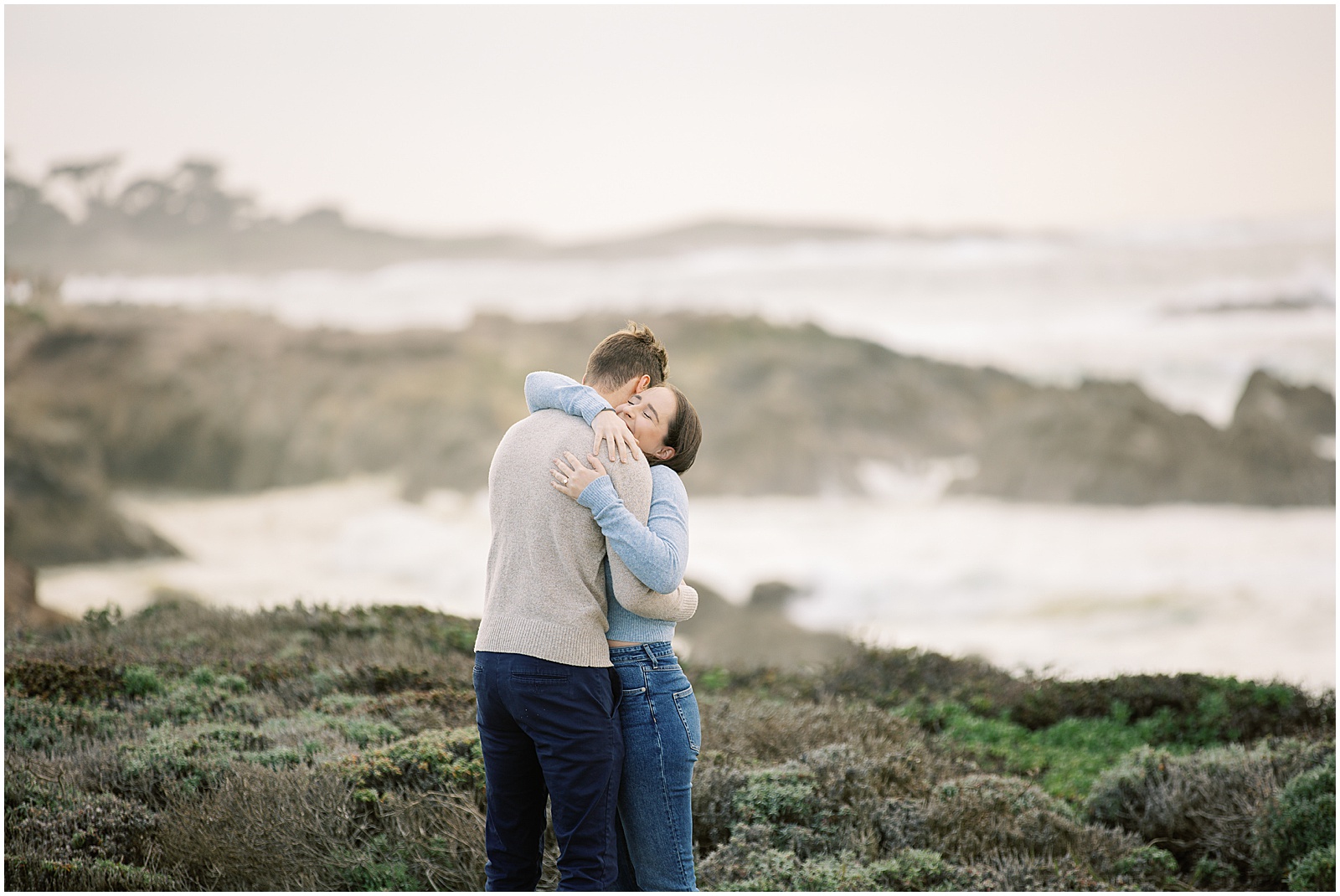 portrait of couple posing next to beach on the coast by film photographer AGS Photo Art