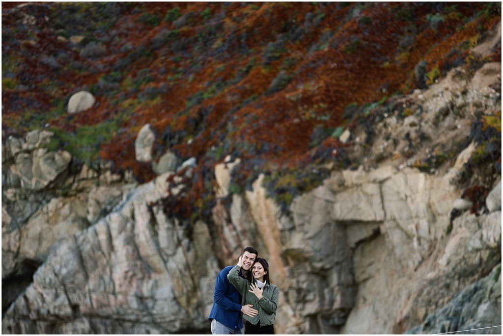 portrait of couple standing by the cliffs of the mountains by film photographer AGS Photo Art