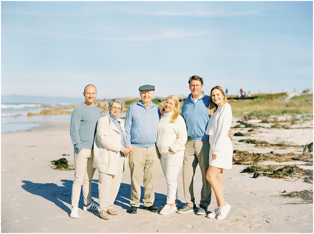 portrait of family standing on the beach by film photographer AGS Photo Art