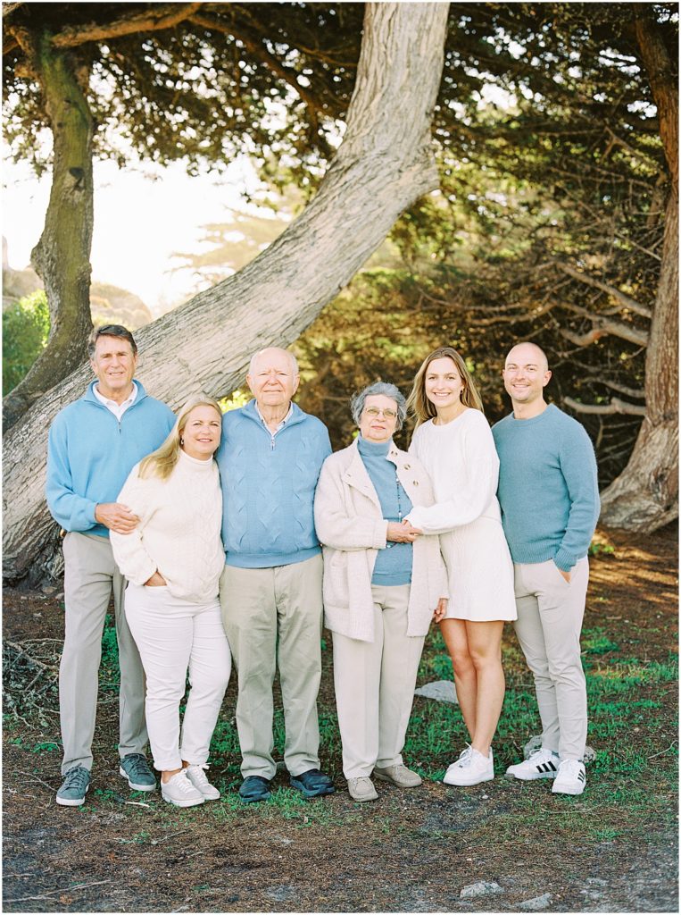 portrait of family standing under large tree by film photographer AGS Photo Art