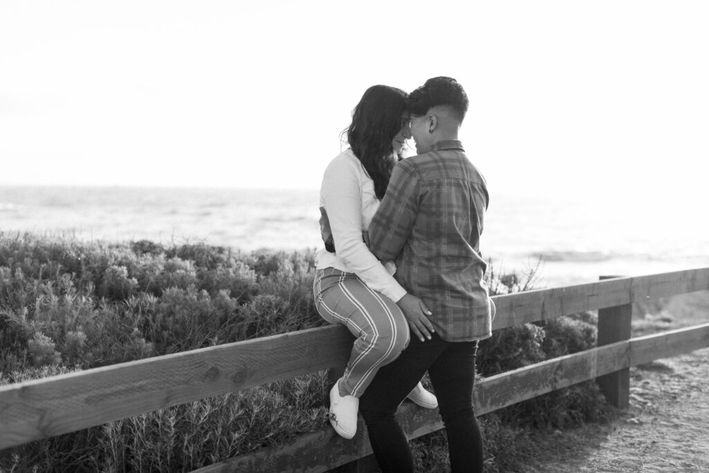 Intimate forehead-to-forehead moment during Carmel engagement photos.