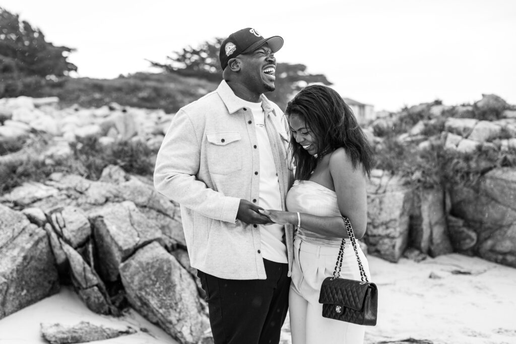Surprise proposal at Spanish Bay with emotional reactions.