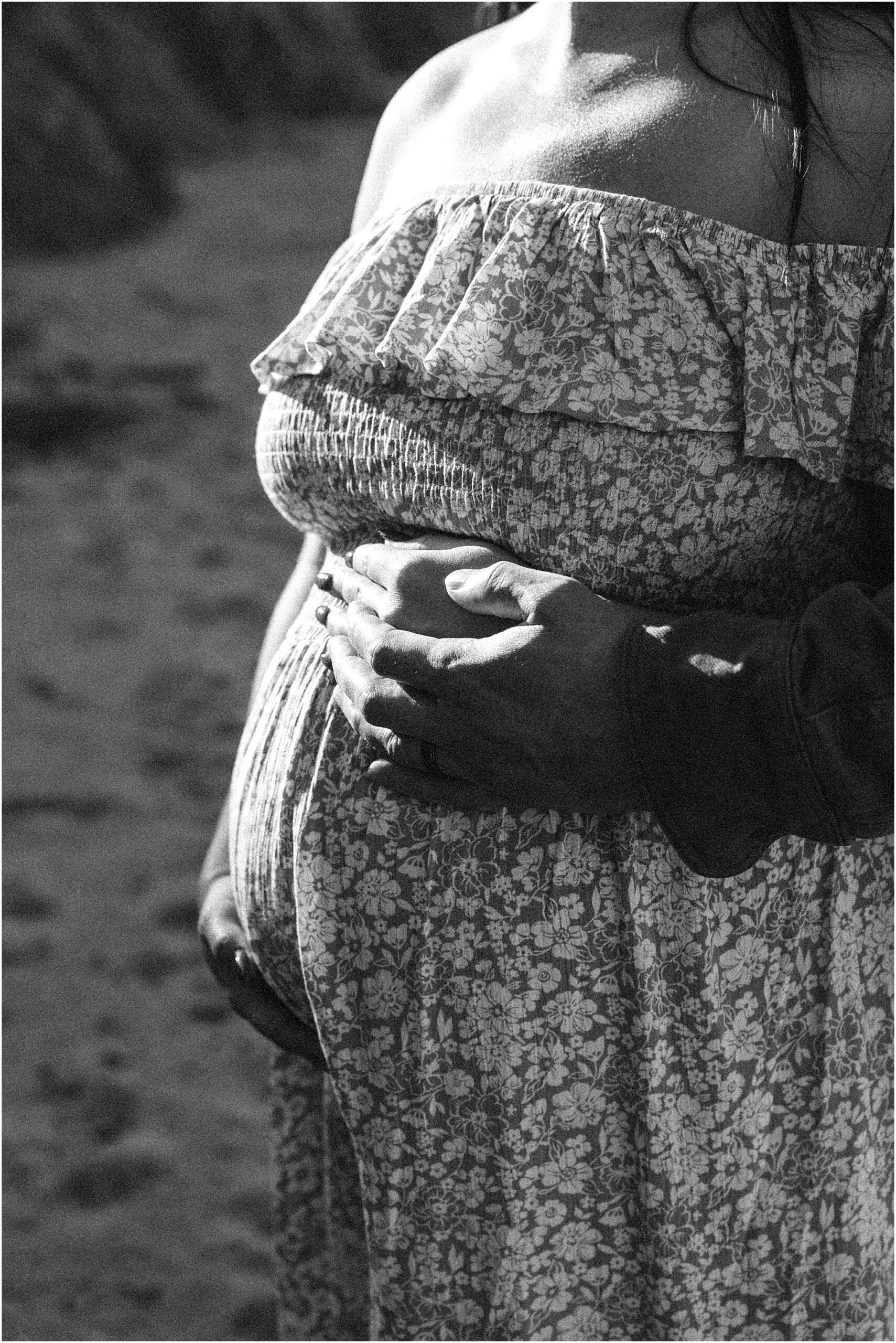 Flowing maternity gown catches the sea breeze in this Big Sur maternity photoshoot.