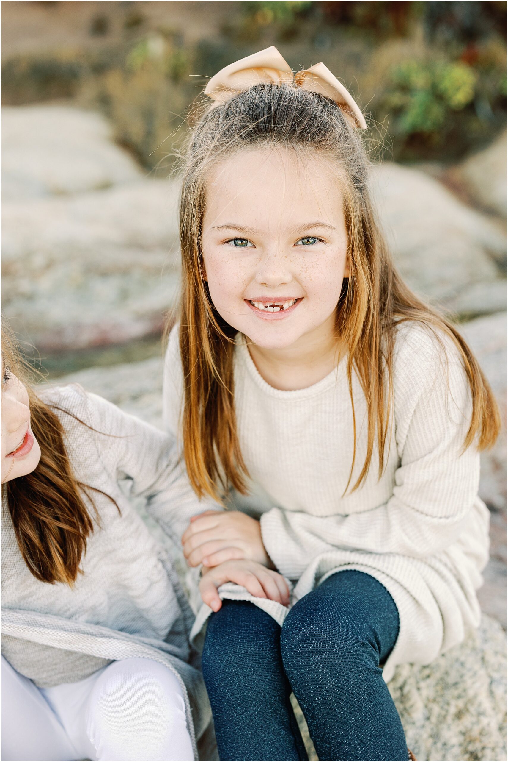 A sweet portrait of daughter during their Carmel Beach family photography session.