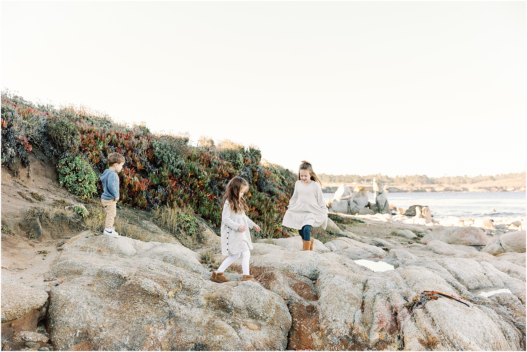Fun family moments on the Carmel shoreline captured by AGS Photo Art.