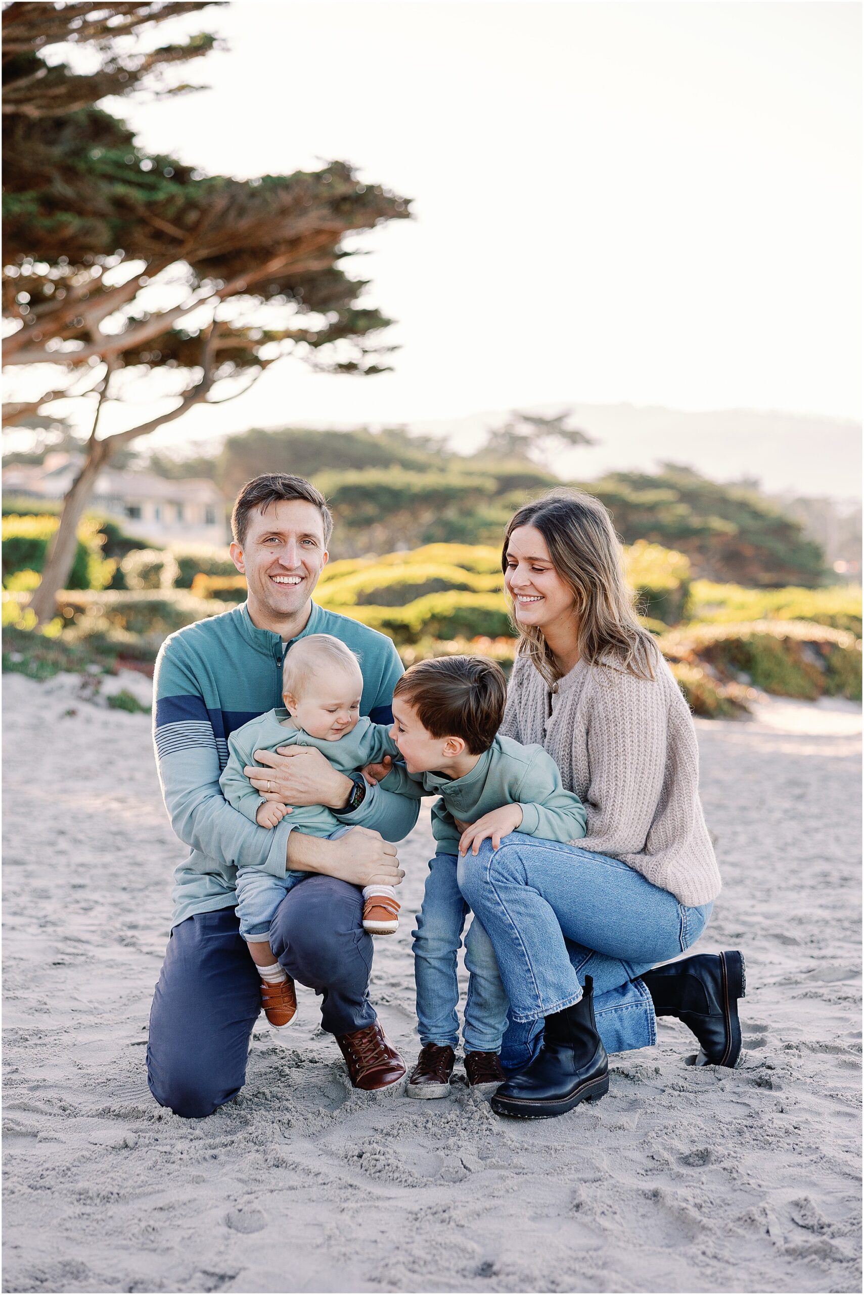 Family by the ocean during Carmel beach family photography