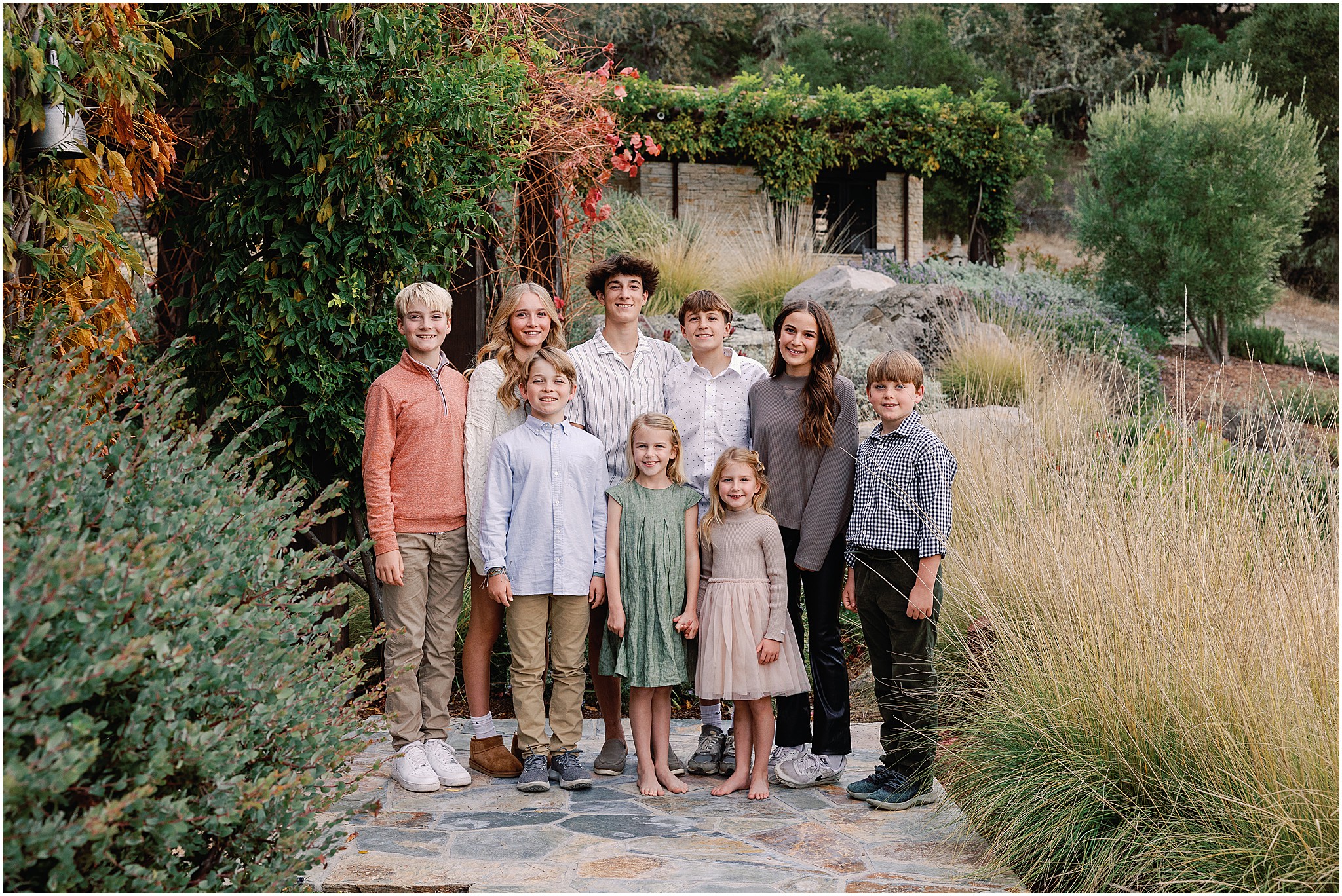 The cousins sharing laughter and connection during their family photo session at the Santa Lucia Preserve.