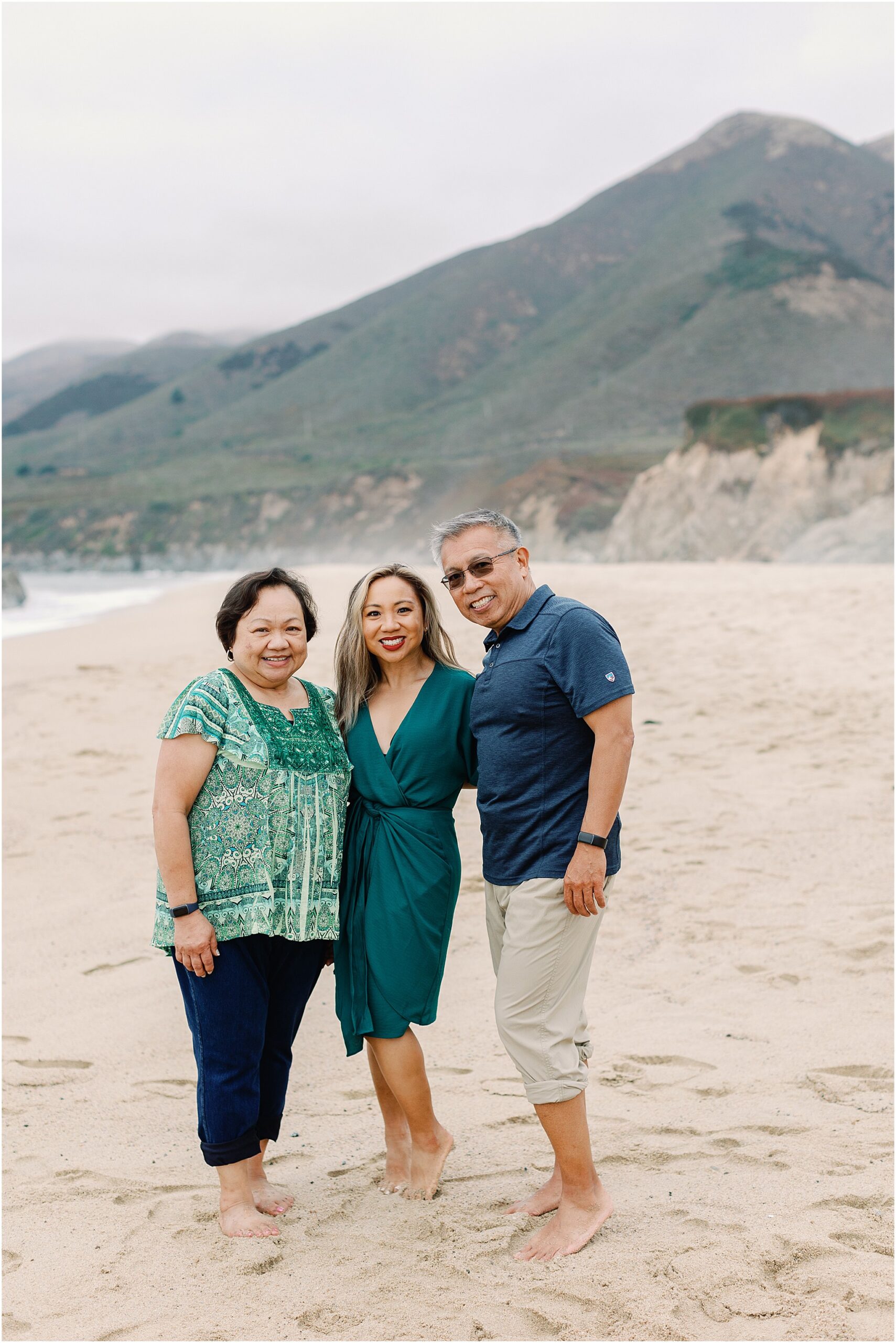 Family moment on the beach in Big Sur captured by AGS PhotoArt.