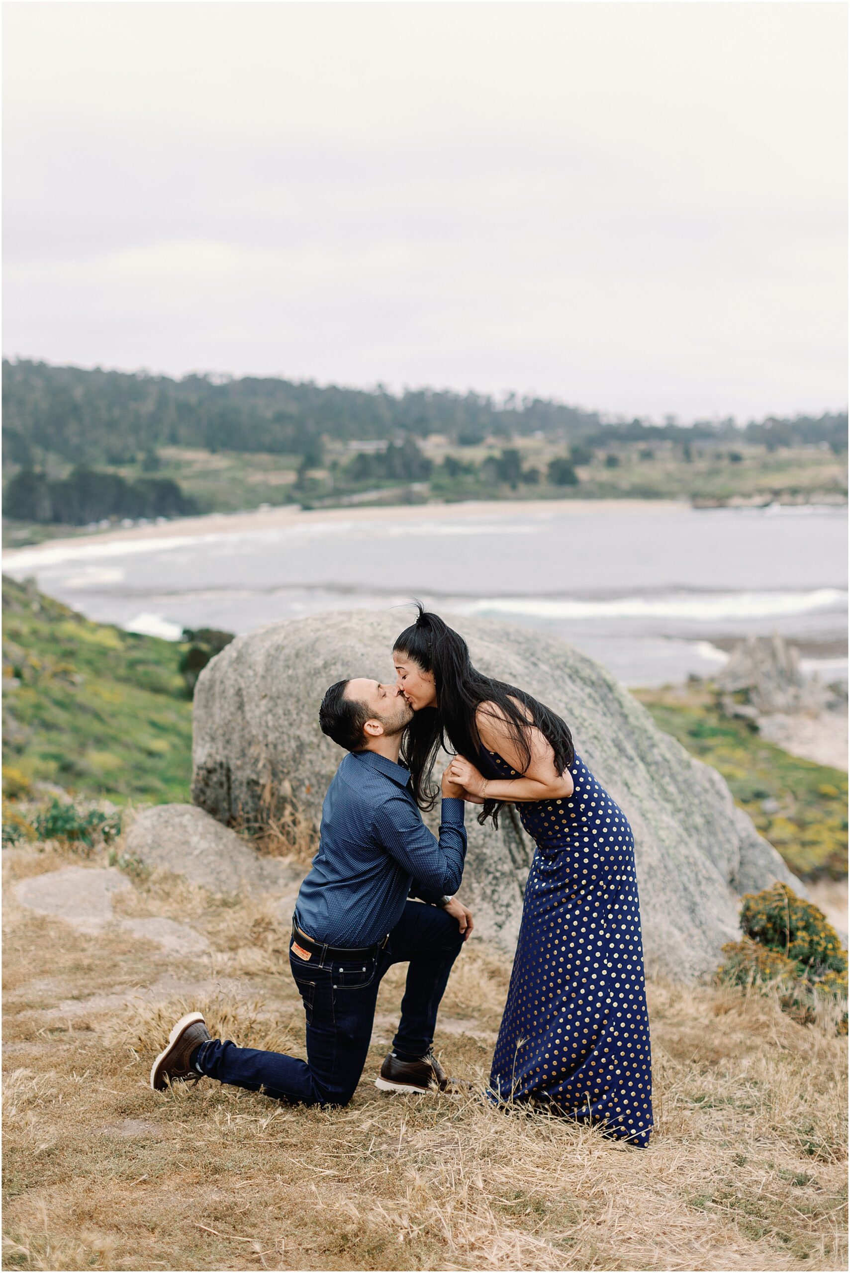 Emotional kiss as Amanda says yes during their Carmel Meadows Beach Proposal.